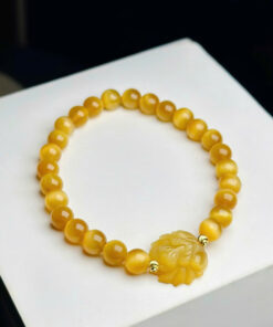 vòng tay đá với hạt đá tròn đều, màu sắc hài hòa và phong cách thanh lịch.